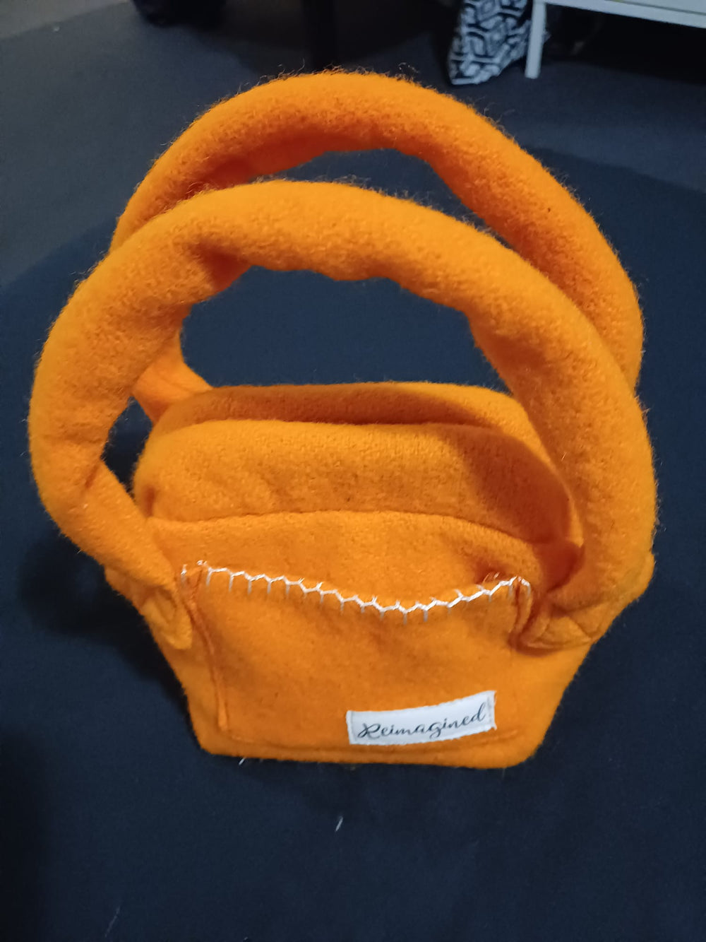 Orange clasp handbag